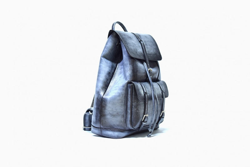 Side view of Leather Trivor Backpack in grey