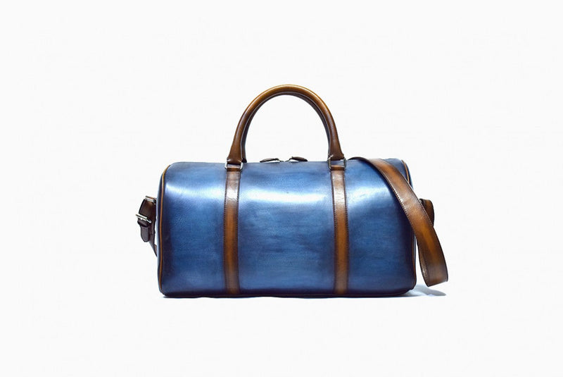 Back view of Leather Dozan Duffel Bag in light blue