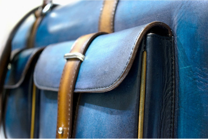 Close view of Leather Dozan Duffel Bag in light blue