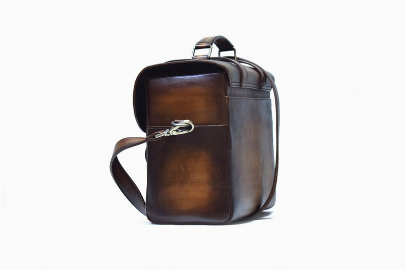 Left view of Leather Miran Crossbody Bag in brown