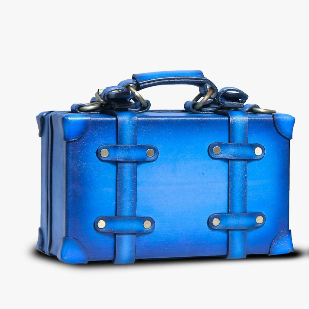 Side view of Leather Sharar Mini Trunk in Blue