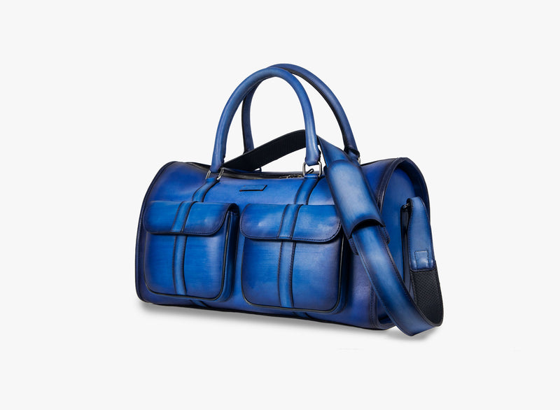 Side view of Leather Dozan Duffel Bag in dark blue