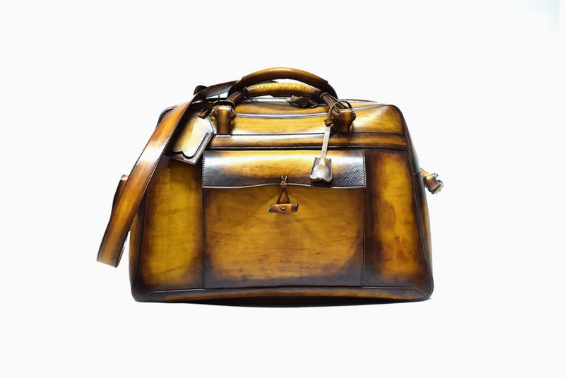 Front view of Leather Bolan Weekender Bag in Yellow