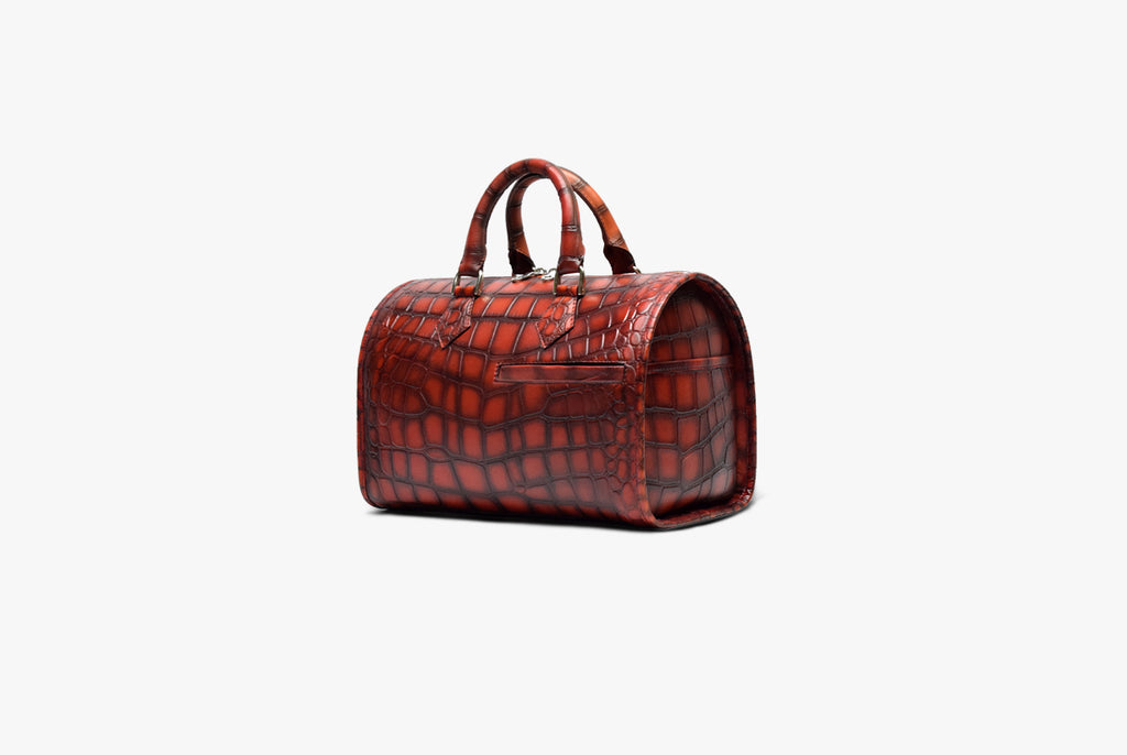 Right view of Leather Mini Duffle Bag in red