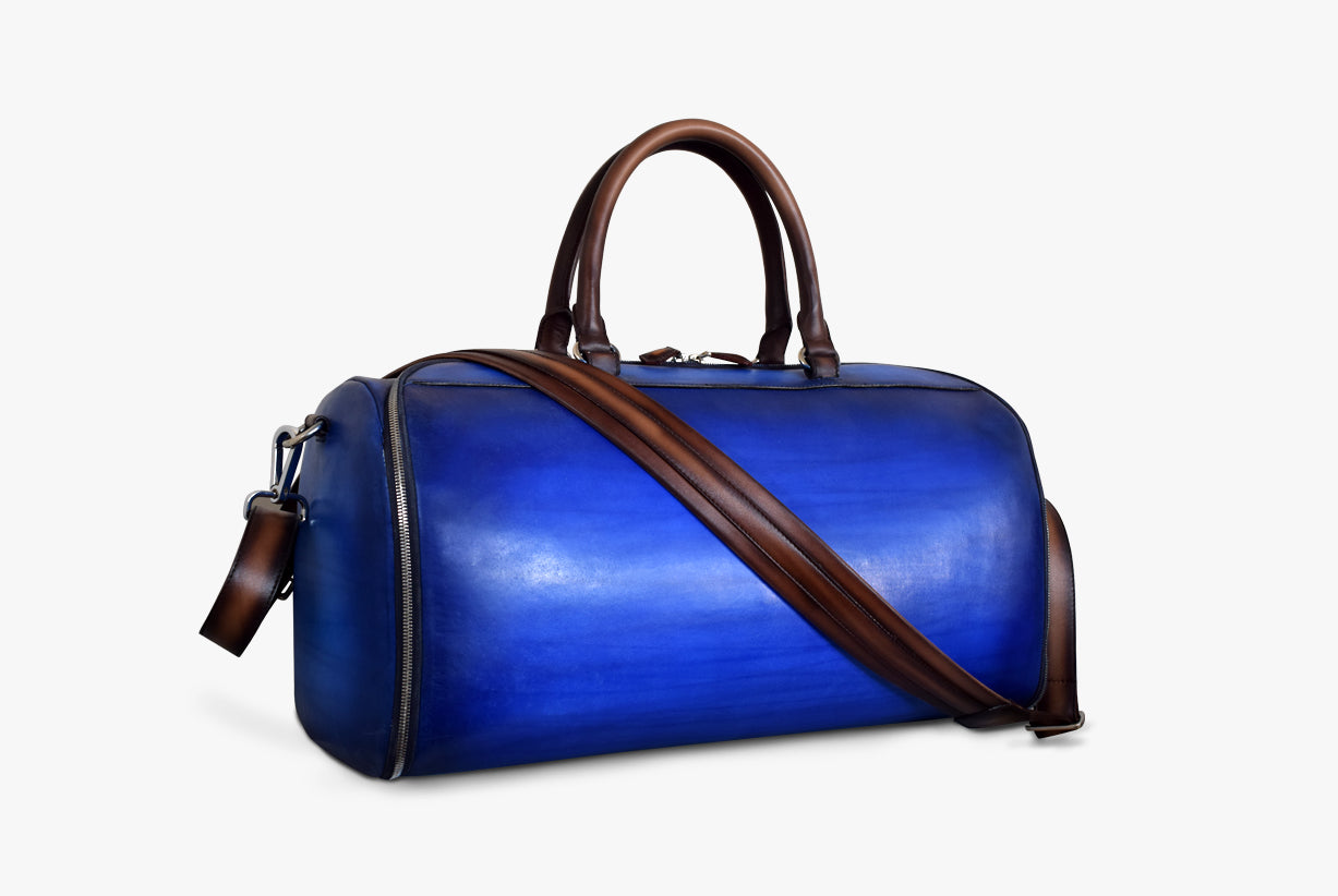 Side view of Leather Garment Duffel Bag in blue