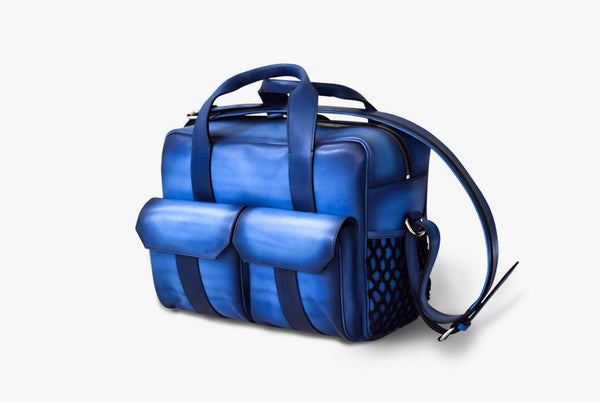 Side view of Leather Horak Overnighter Bag in blue