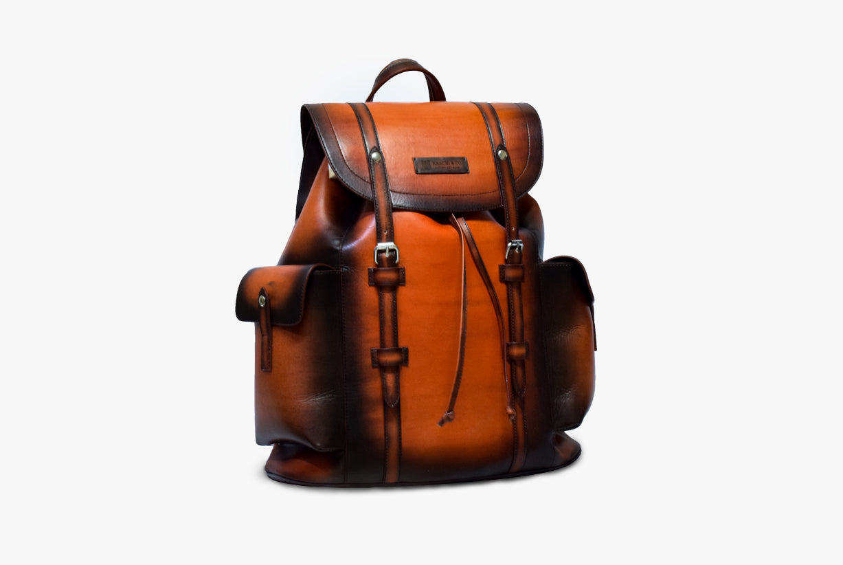 Side view of Leather Mach Backpack in orange