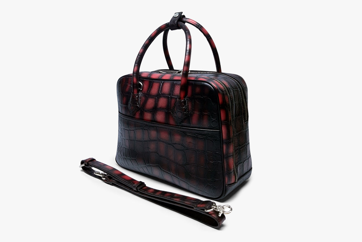 Side view of Leather Duffle Bag in red